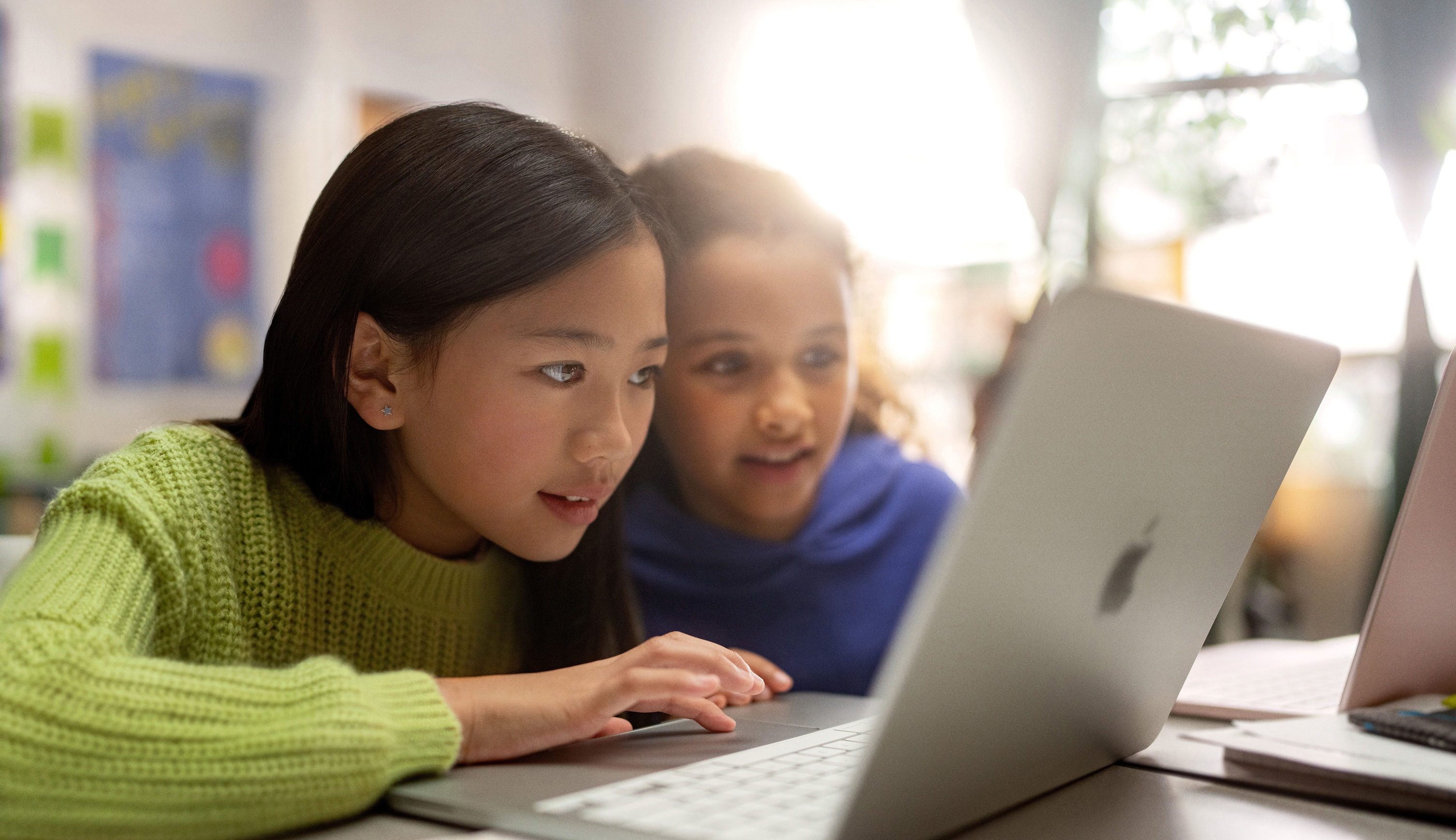 Students working together on a laptop